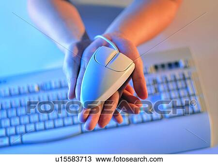 Stock Image - holding, finger, hand, keyboard, mouse. Fotosearch