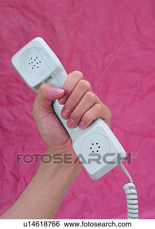 Stock Photograph - holding, receiver, finger, telephone, hand, fingernail. Fotosearch