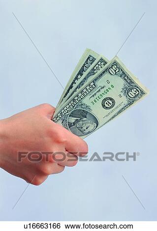 Stock Photograph - knuckle, money, fist, hand, cash, currency. Fotosearch