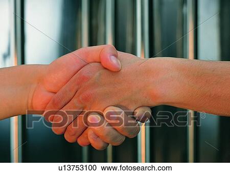 Stock Image - shaking, agreement, hand, clasped, partnership, friendship. Fotosearch