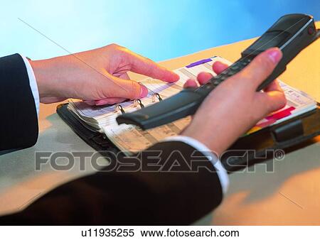Stock Photography - business, light, shadow, notebook, object, hand. Fotosearch