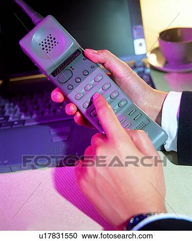 Stock Image - computer, cup, wireless telephone, notebook, object, action. Fotosearch