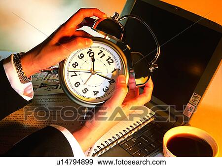 Stock Photo - computer, hand, action, cup, shadow, newspaper. Fotosearch