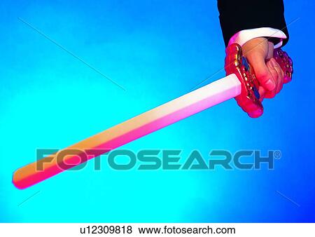 Stock Photo - indoor, action, shadow, wooden, hand, object. Fotosearch