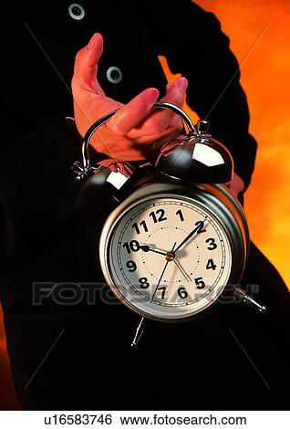 Stock Photograph - indoor, hand, object, action, light, shadow. Fotosearch