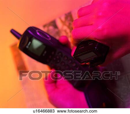 Stock Image - indoor, light, shadow, hand, action, object. Fotosearch