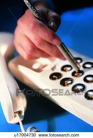 Stock Image - indoor, light, shadow, hand, action, object. Fotosearch