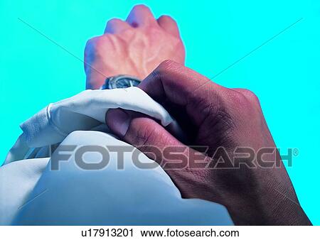 Stock Image - indoor, light, shadow, hand, action, object. Fotosearch