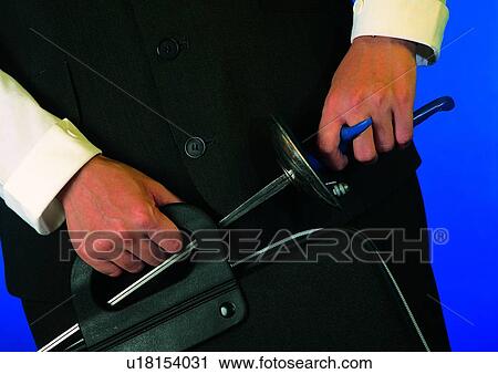 Stock Image - indoor, light, shadow, hand, action, object. Fotosearch