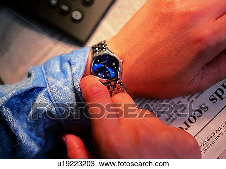 Stock Image - indoor, light, shadow, hand, action, object. Fotosearch