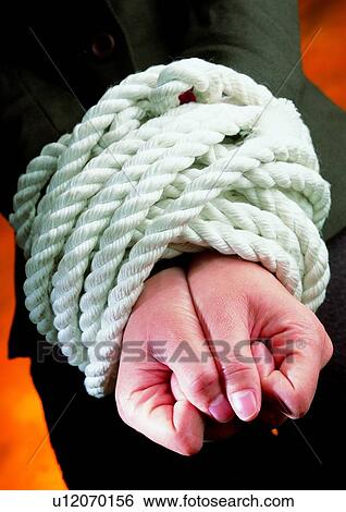 Stock Photograph - indoor, light, shadow, hand, action, object. Fotosearch