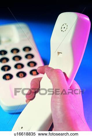 Stock Photography - indoor, light, shadow, hand, action, object. Fotosearch