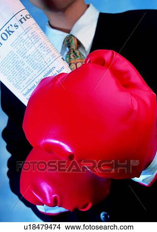 Picture - light, shadow, glove, action, newspaper, boxing gloves, hand. Fotosearch
