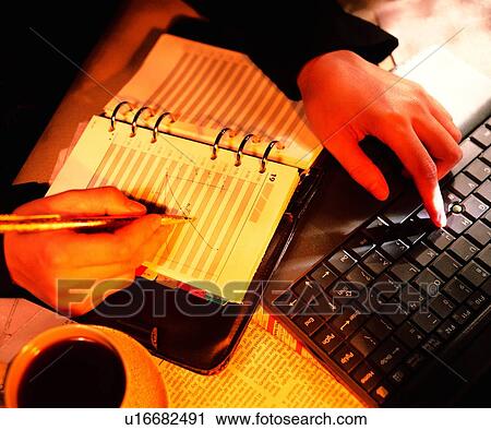 Stock Image - newspaper, computer, shadow, light, action, object. Fotosearch