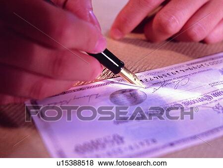 Stock Photo - object, hand, pen, action, light, indoor. Fotosearch