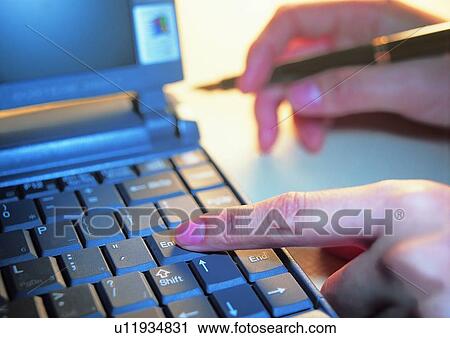 Stock Image - pen, finger, object, hand, shadow, computer. Fotosearch