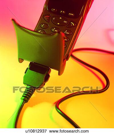 Stock Photo - mobile, office, cell phone, mobile phone. Fotosearch