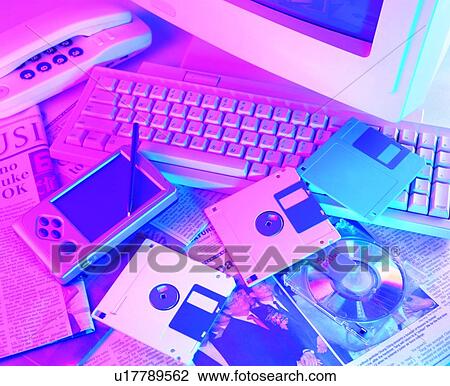 Stock Image - newspaper, computer, keyboard, office, MO disk. Fotosearch