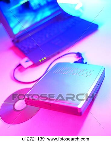 office, CD-ROM drive, CD-ROM, notebook View Large Photo Image Stock Photo - office, CD-ROM drive, CD-ROM, notebook. Fotosearch