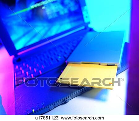 Stock Image - office, floppy disk, lap-top, screen. Fotosearch