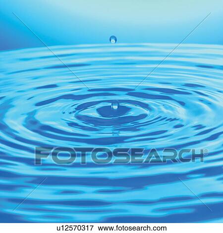 Stock Photo - round, close-up, drops, appearance, impact, background, phenomenon. Fotosearch