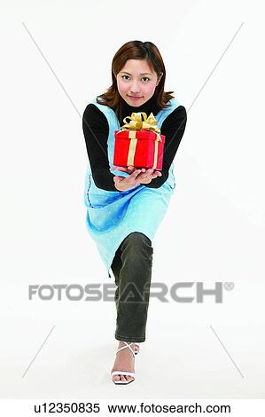 Asian Ethnicity, Brown Hair, Body Language, Bending, Apron View Large Photo Image Stock Photography - Asian Ethnicity, Brown Hair, Body Language, Bending, Apron. Fotosearch