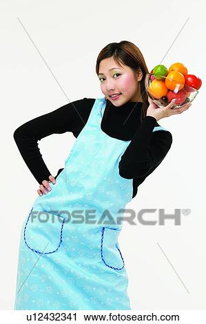 Brown Hair, Apron, Body Language, Bending, Asian Ethnicity, Apple View Large Photo Image Stock Image - Brown Hair, Apron, Body Language, Bending, Asian Ethnicity, Apple. Fotosearch