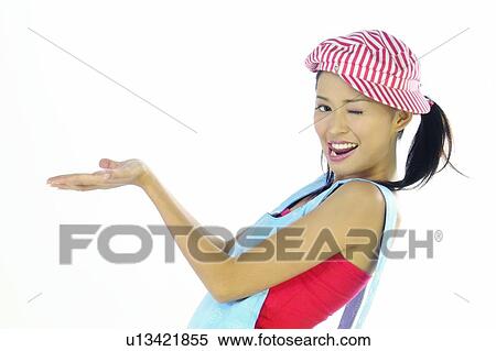Brown Hair, Asian Ethnicity, Body Language, Bending Over Backwards, Baseball Cap, Apron View Large Photo Image Stock Photography - Brown Hair, Asian Ethnicity, Body Language, Bending Over Backwards, Baseball Cap, Apron. Fotosearch