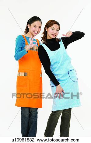 Casual Clothing, Apron, Brown Hair, Body Language, Asian Ethnicity, Adults Only View Large Photo Image Stock Image - Casual Clothing, Apron, Brown Hair, Body Language, Asian Ethnicity, Adults Only. Fotosearch