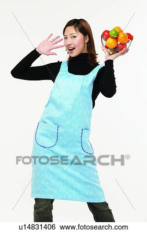 Casual Clothing, Apron, Brown Hair, Body Language, Asian Ethnicity, Apple View Large Photo Image Stock Photograph - Casual Clothing, Apron, Brown Hair, Body Language, Asian Ethnicity, Apple. Fotosearch