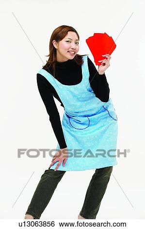 Casual Clothing, Asian Ethnicity, Brown Hair, Body Language, Bending, Apron View Large Photo Image Stock Photograph - Casual Clothing, Asian Ethnicity, Brown Hair, Body Language, Bending, Apron. Fotosearch
