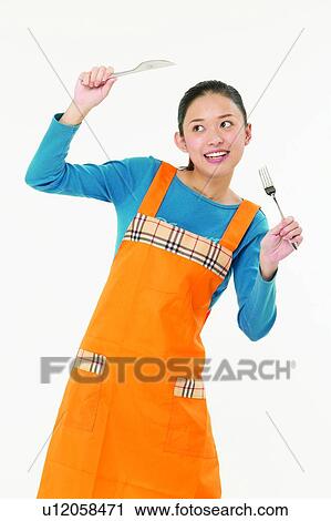Casual Clothing, Asian Ethnicity, Butter Knife, Brown Hair, Body Language, Apron View Large Photo Image Stock Image - Casual Clothing, Asian Ethnicity, Butter Knife, Brown Hair, Body Language, Apron. Fotosearch