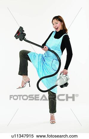 Cleaning, Asian Ethnicity, Casual Clothing, Brown Hair, Body Language, Apron View Large Photo Image Stock Photography - Cleaning, Asian Ethnicity, Casual Clothing, Brown Hair, Body Language, Apron. Fotosearch
