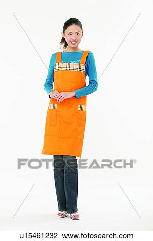 Stock Image - Clipping Path, Asian Ethnicity, Casual Clothing, Brown Hair, Body Language, Apron. Fotosearch