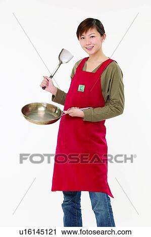 Stock Image - Clipping Path, Japanese Ethnicity, Apron, Casual Clothing, White Background, Body Language. Fotosearch