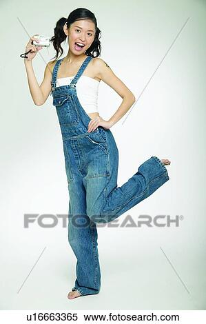 Stock Photography - Happiness, Technology, Body Language, Looking At Camera. Fotosearch