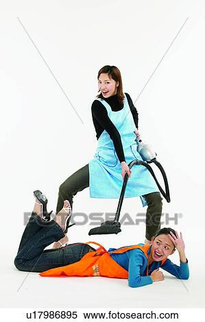 Home Improvement, Young Adult, Mischief, Casual Clothing, Asian Ethnicity View Large Photo Image Stock Photography - Home Improvement, Young Adult, Mischief, Casual Clothing, Asian Ethnicity. Fotosearch