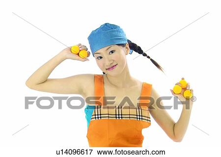 Stock Photo - Lifestyles, Standing, Indoor, Waist-Up, Smiling, Brown Hair. Fotosearch