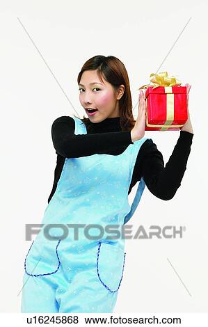 Looking At Camera, Holding, Cut Out, Standing, Brown Hair View Large Photo Image Stock Photo - Looking At Camera, Holding, Cut Out, Standing, Brown Hair. Fotosearch