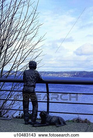 Stock Image - ponder, male, watch, stand, survey, look. Fotosearch