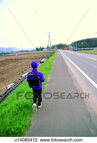 Stock Image - roadside, backpage, farmland, child, walk, countryside. Fotosearch