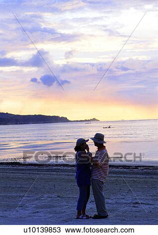 sea, coast, sunset, lover, male, woman View Large Photo Image Stock Image - sea, coast, sunset, lover, male, woman. Fotosearch