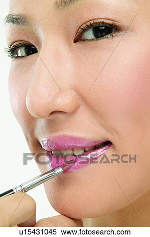Asian Ethnicity, Close-Up, Applying View Large Photo Image Stock Photography - Asian Ethnicity, Close-Up, Applying. Fotosearch