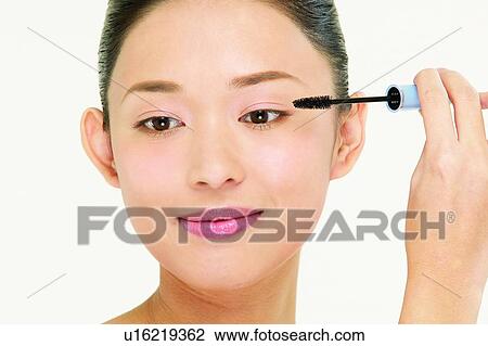 Asian Ethnicity, Close-Up, Black Hair, Applying View Large Photo Image Stock Image - Asian Ethnicity, Close-Up, Black Hair, Applying. Fotosearch