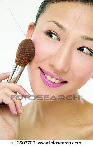 Asian Ethnicity, Close-Up, Brushing, Applying View Large Photo Image Stock Photo - Asian Ethnicity, Close-Up, Brushing, Applying. Fotosearch
