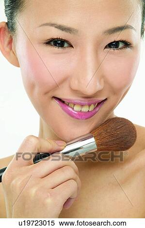 Asian Ethnicity, Close-Up, Brushing, Applying View Large Photo Image Stock Photography - Asian Ethnicity, Close-Up, Brushing, Applying. Fotosearch