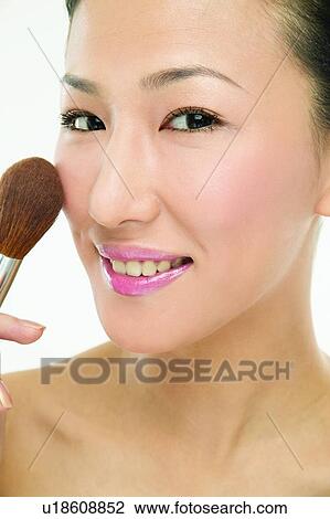 Cosmetics, Toothy Smile, Close-Up, Smiling, Inner Beauty, Young Adult, Applying View Large Photo Image Stock Image - Cosmetics, Toothy Smile, Close-Up, Smiling, Inner Beauty, Young Adult, Applying. Fotosearch