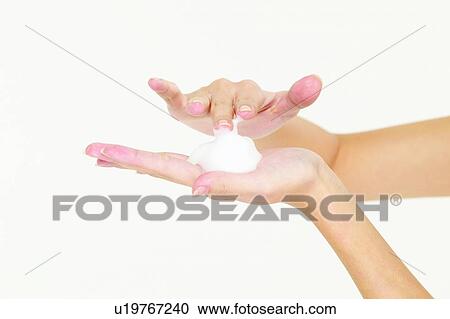Stock Image - Cream, Human Hand, Human Finger, Applying. Fotosearch