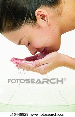 Stock Photo - Freshness, Eyes Closed, Washing Face, Water, Hygiene, Wet. Fotosearch