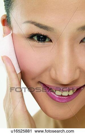 Stock Image - Human Hand, Smiling, Beauty, Young Adult, Asian Ethnicity. Fotosearch
